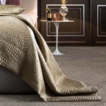 Carpet Reed, plain taupe-grey loop pile close-up