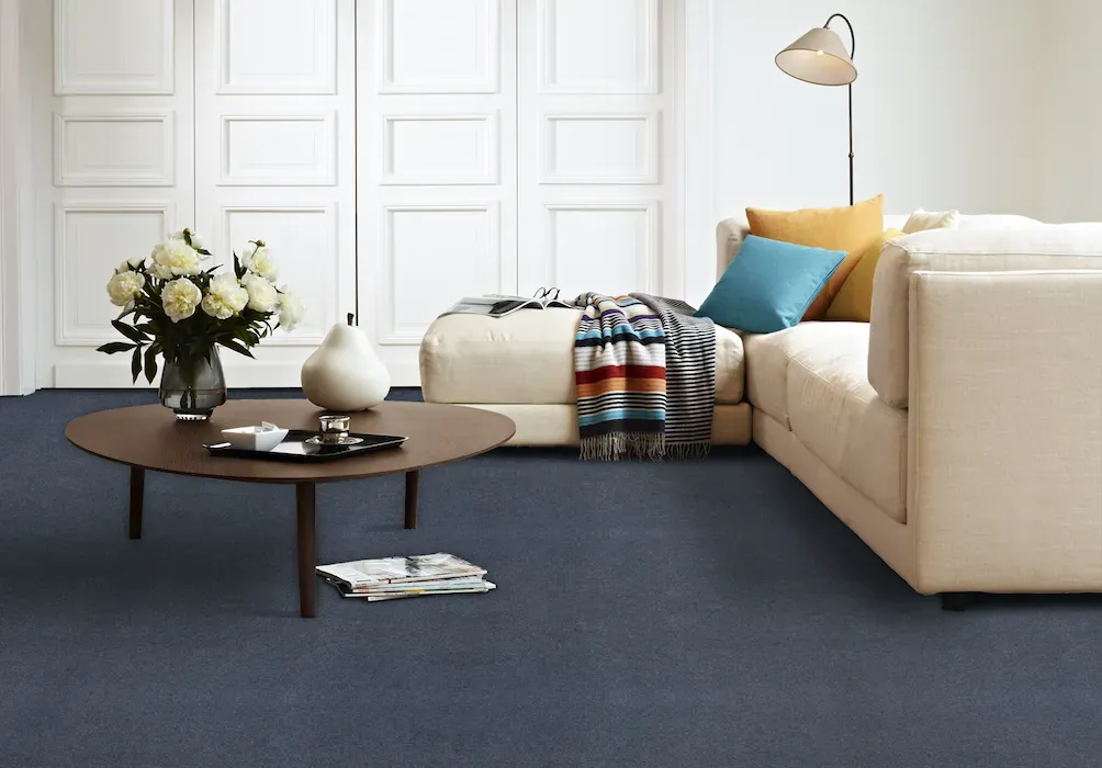 Carpet Lagoon, navy carpet in a furnished living room