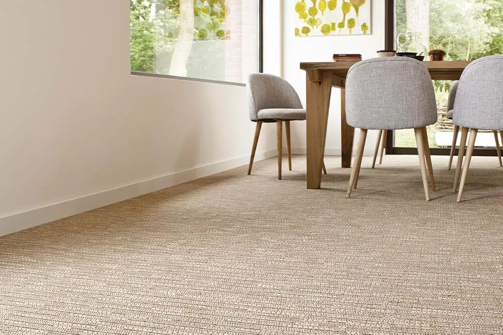 Custom rug Wicker, beige woven texture under a dining table