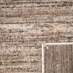 Custom rug Spice, beige loop pile flecked with rust and black
