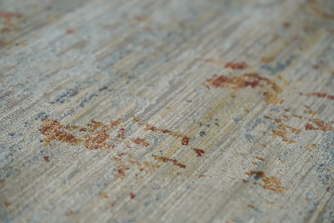 Custom rug Rock, cream ground with rust and blue-grey streaks