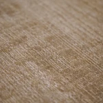 Custom rug Sienna, plain ochre surface with fine diagonal striations