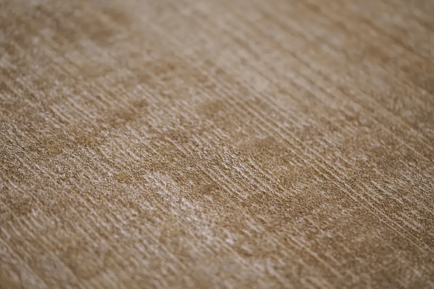 Custom rug Sienna, plain ochre surface with fine diagonal striations
