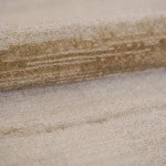 Custom rug Sienna, plain ochre surface with fine diagonal striations