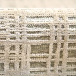 Custom rug Almond, ivory embossed geometric weave in close-up