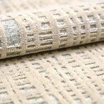 Custom rug Almond, ivory embossed geometric weave in close-up
