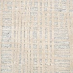Custom rug Almond, ivory embossed geometric weave in close-up