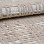 Custom rug Bistre, close-up of raised ochre diamond pattern