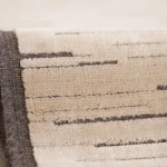 Custom rug Bamboo, close-up of brown stripes on beige