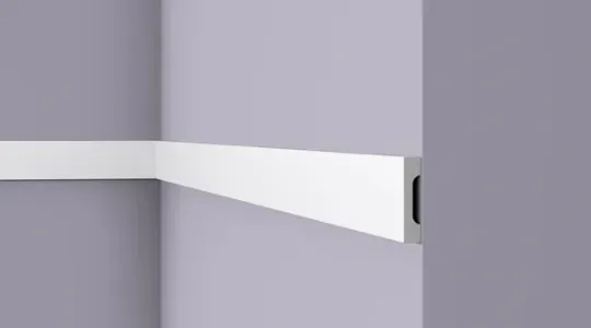 Flat wall moulding with shadow groove along its lower edge