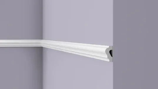 Wall moulding with curved classic profile and underside groove