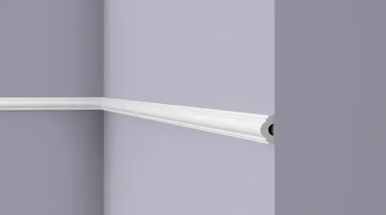 Slim wall moulding with cable channel visible at the cut end