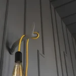 Slim wall moulding with cable channel visible at the cut end