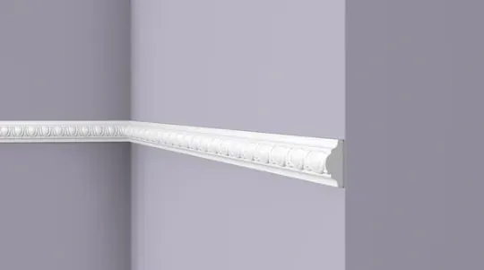 Classic cornice with floral frieze, mitred at a ceiling corner