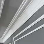 Classic cornice with floral frieze, mitred at a ceiling corner
