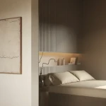 Fluted wall panel with flat-topped ribs under raking light