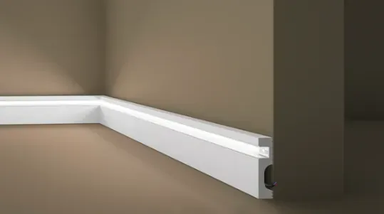 Profiled skirting board with LED channel, warm amber glow
