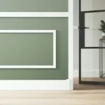 Tall flat skirting board in light grey, recessed line and clip