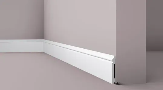 Tall flat skirting board in deep grey with visible fixing clip