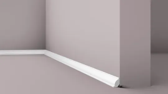 Skirting board with rounded top edge, matt finish at floor level