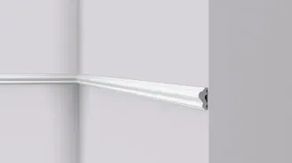 Slim rounded dado moulding along a painted wall