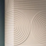 Wall moulding with fluted arches in terracotta, close-up