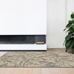 Rug Sisal, large grey leaves on a light beige ground