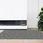 Rug Basalt, midnight-blue interlocking arches on a grey-taupe ground