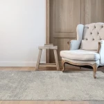 Rug Lead, soft flecked light grey surface close up
