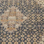 Rug Platinum, indigo medallion with beige florals on ivory