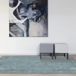 Rug Periwinkle, blue-green medallion rug with patinated finish