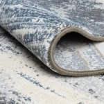 Rug Dawn, folded corner showing pile and beige border