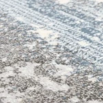 Rug Dawn, folded corner showing pile and beige border