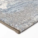 Rug Dawn, folded corner showing pile and beige border