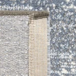 Rug Dawn, folded corner showing pile and beige border