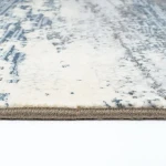 Rug Dawn, folded corner showing pile and beige border