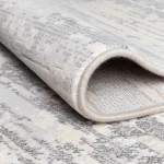 Rug Veiled Pewter in mottled grey concrete-effect stripes