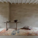 Rug Buckwheat with an abstract rust, blue and beige blend
