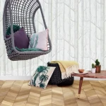 Vinyl flooring Straw, light beige planks in a herringbone lay