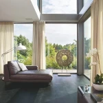 Vinyl flooring Black Ash, black stone-effect tiles flecked with grey