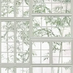 Wall mural Cloud, bamboo behind green trellis on pale ground