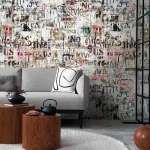 Wall mural Pebble, layered typography on weathered grey and beige