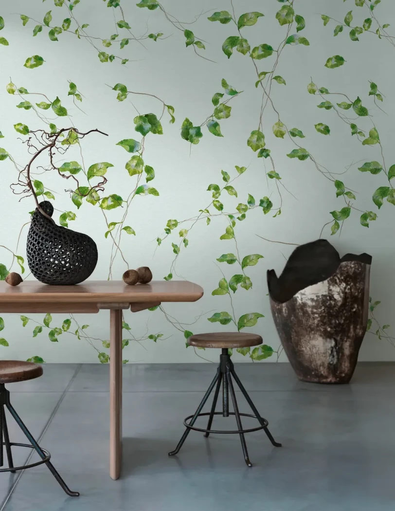 Wall mural Rain with scattered green leaves on pale grey