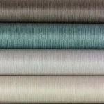 Wallpaper Hazelnut in plain brown with fine vertical striations
