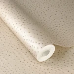Wallpaper Praline, soft cream with a fine grained-skin texture