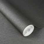 Wallpaper Mica in plain charcoal grey with fine matt fibres