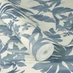 Wallpaper Blue Slate, slate blue tropical leaves on a cream ground