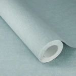Wallpaper Abyss in plain blue-grey with a fine mottled grain