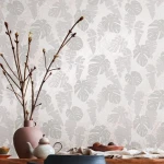 Wallpaper Veiled Granite, grey monstera and banana leaves on white