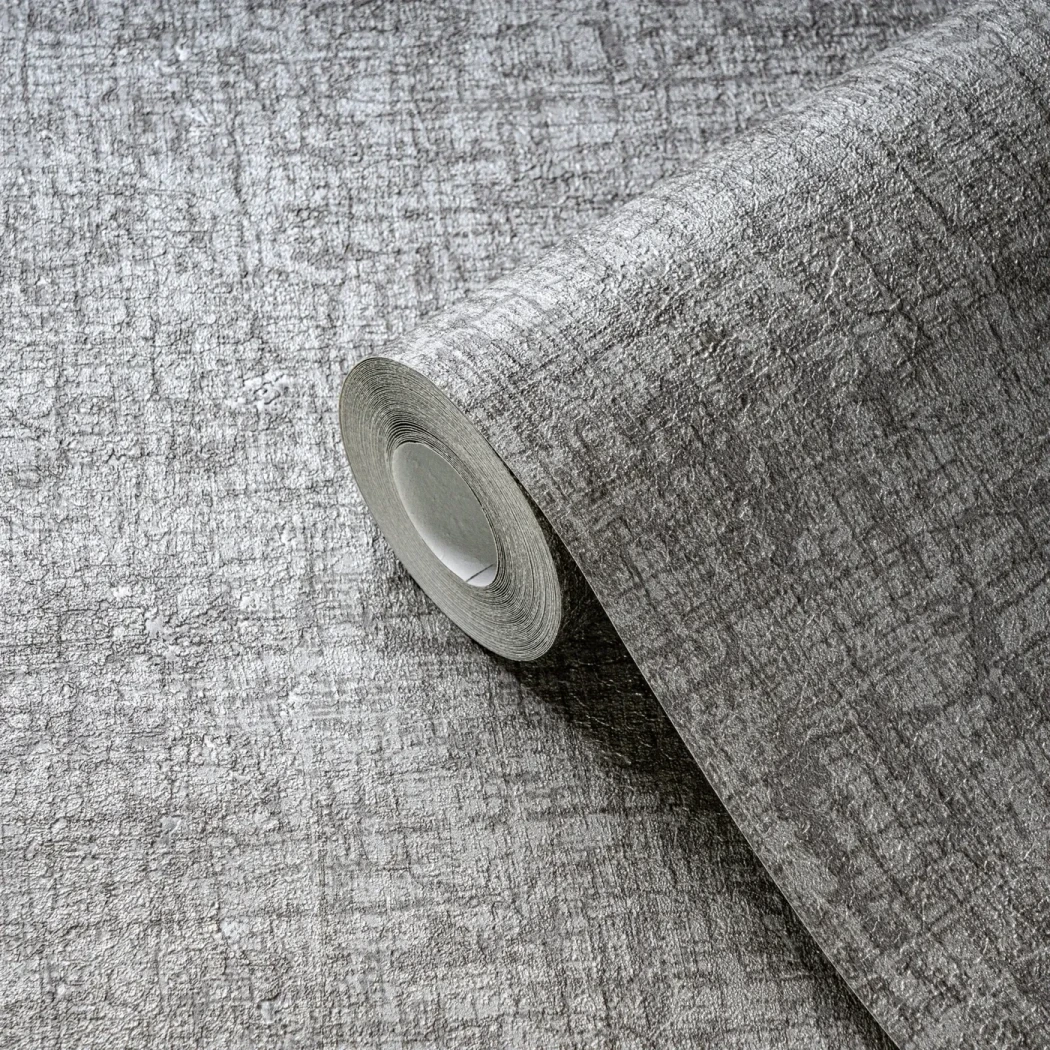 Wallpaper Ashen Steel, grey canvas roll shown at an angle